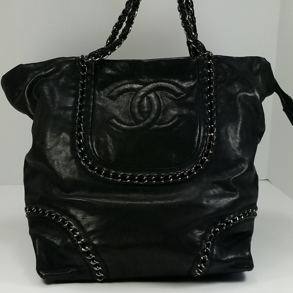 CHANEL Handbags - Chanel Tote Black glazed caviar Leather w/dust bag